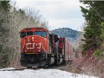 A pair of GM locomotives leads CN 402 at Avenue Voyer in Le Bic